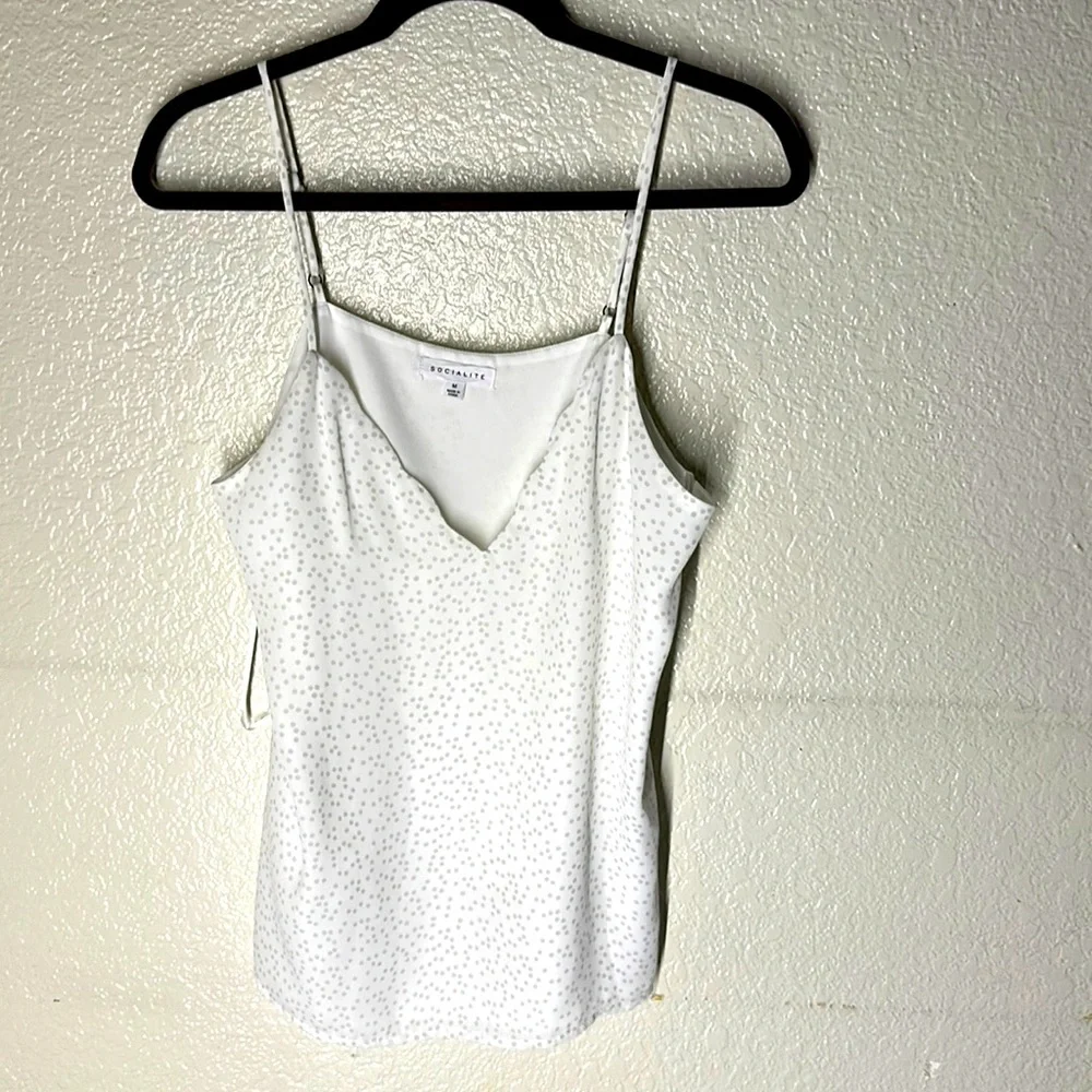 NWOT. Woman’s Socialite white dotted spaghetti strap tank top. Size M.